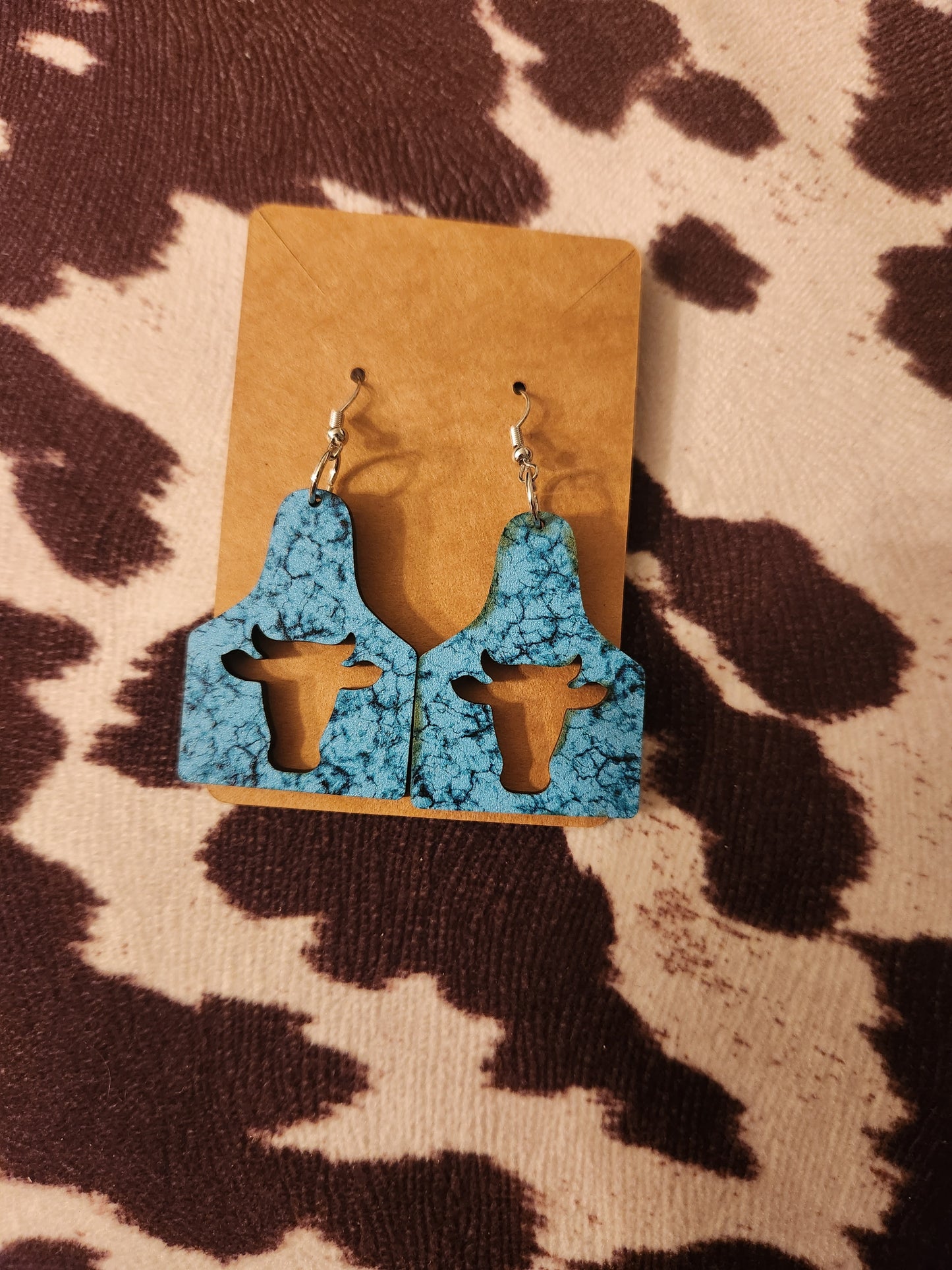 Show Tag Steer Earrings